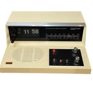Montgomery Ward 1970s Airline Flip Clock Radio Model GEN-1983A Cream Colored